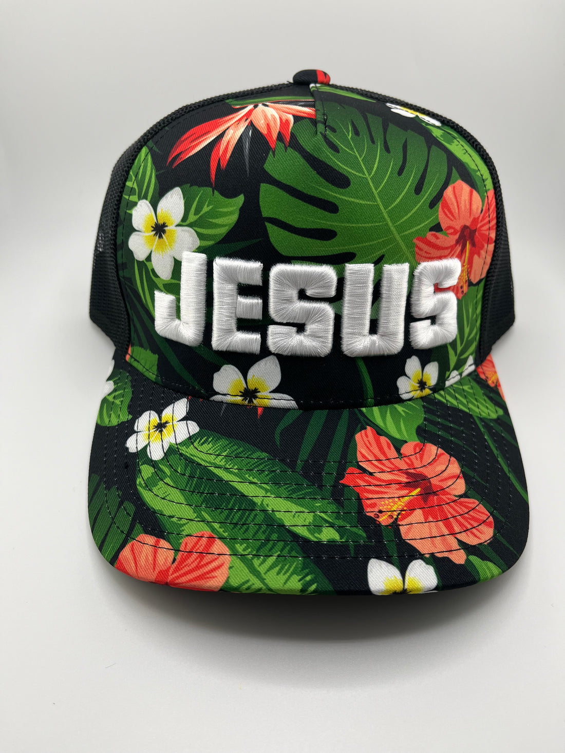 Tropical Floral Trucker Hat with White "JESUS" Embroidery