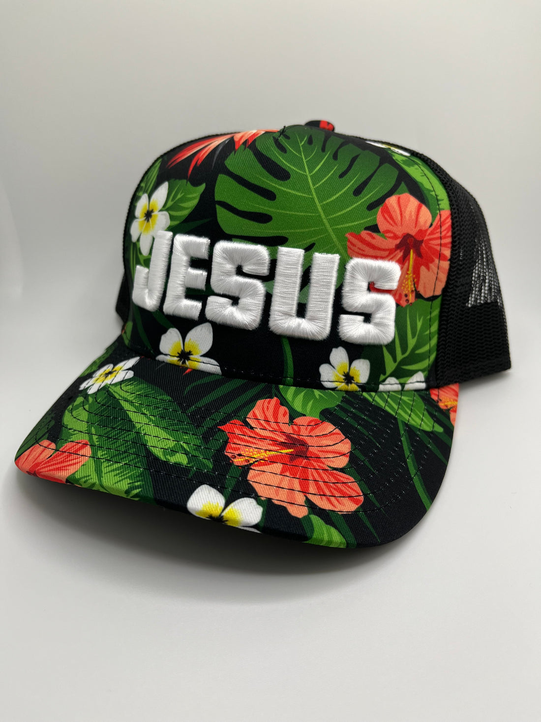 Tropical Floral Trucker Hat with White "JESUS" Embroidery