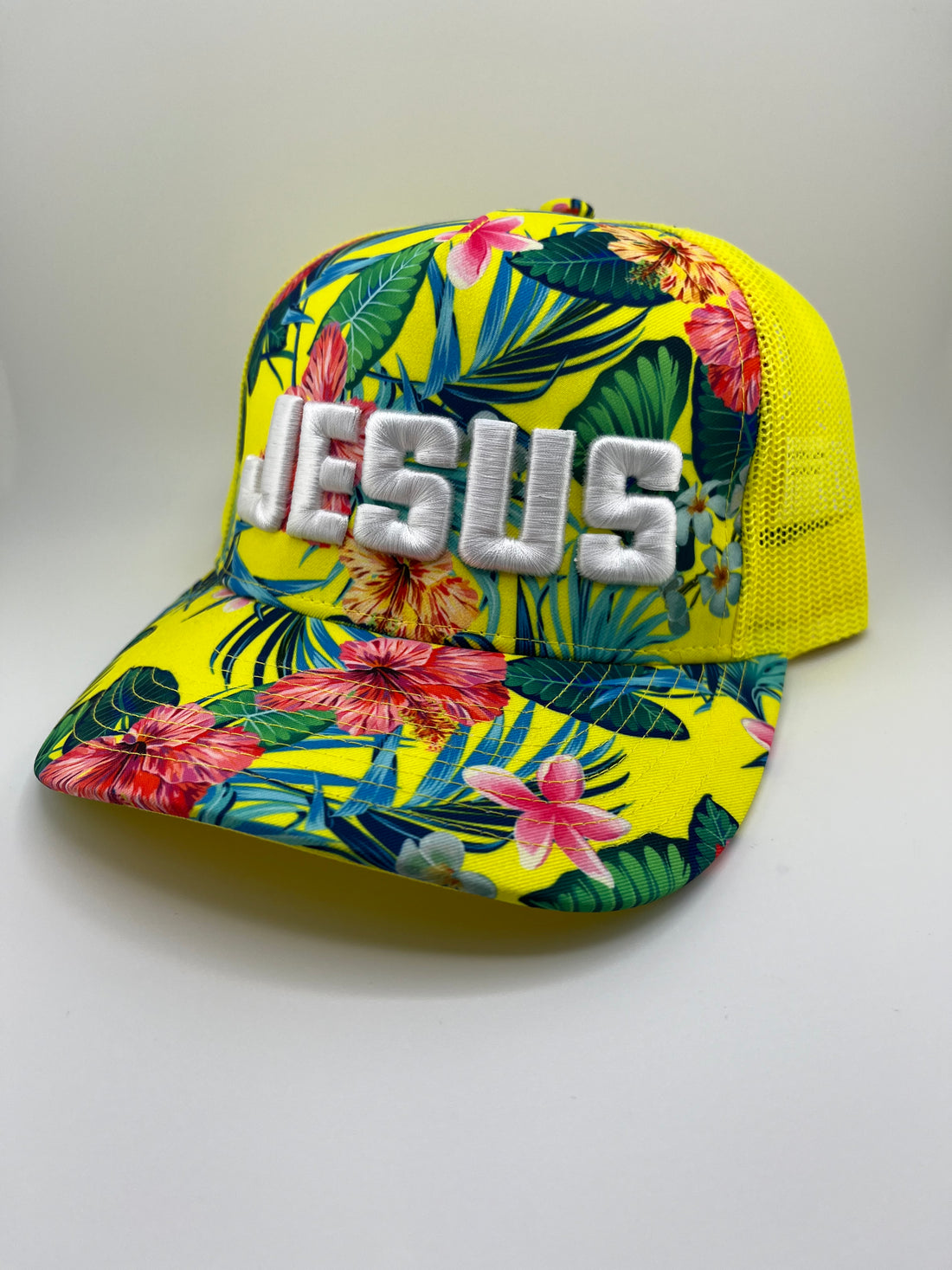 Tropical Floral Trucker Hat with White "JESUS" Embroidery